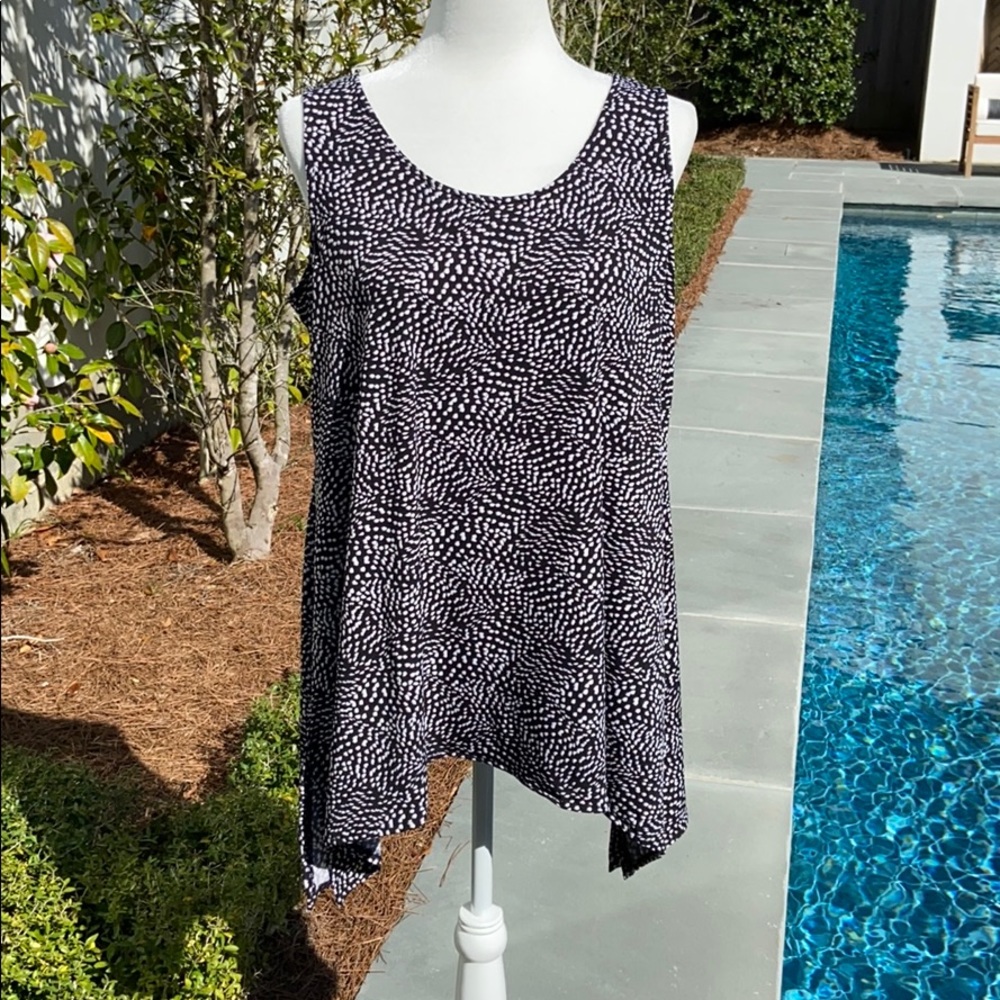 Alfani sleeveless top with scoop neckline.